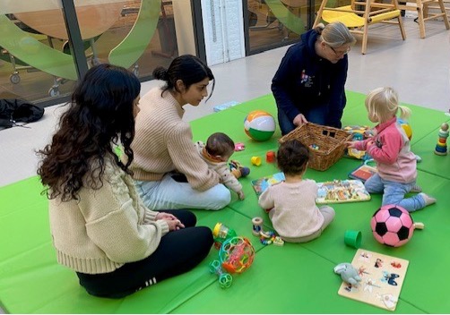 Parents and children playing together at the Parent & Child Playgroup